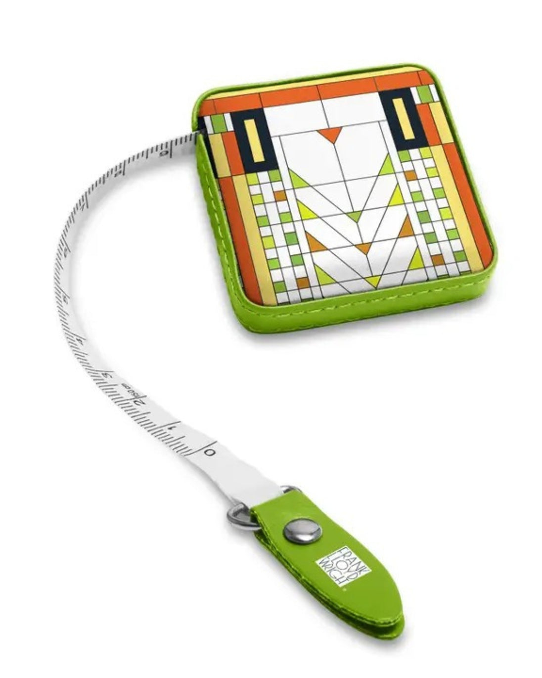 Green tape measure with a geometric patterned case on a white background